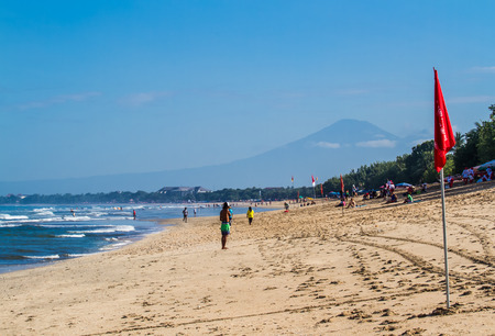 BALI,INDONESIA-AUGUST 23 : People relaxing at Kuta beach on August 23,2016.Kuta beach is the most popular beach in Bali.のeditorial素材