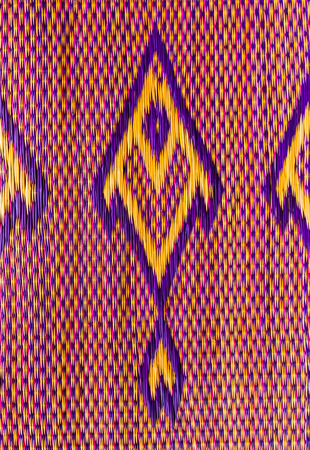 Fish pattern of  papyrus mat close up background .の写真素材