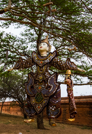 Myanmar puppets hanging on the tree .の写真素材