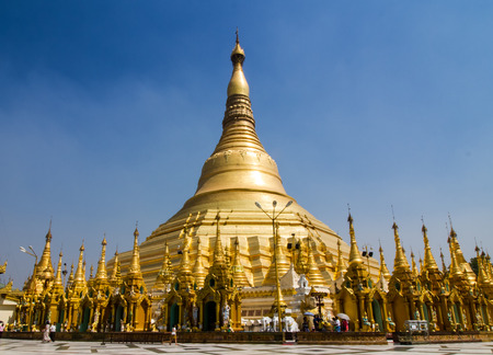 YANGON,MYANMAR-MARCH 15,2017: Famous Shwedagon Pagoda (Stupa) with visitors, tourists and locals walking around .The golden pagoda in  Yangon , Myanmar.のeditorial素材