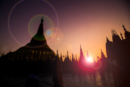 Silhouette of Shwedagon pagoda while sunset.の写真素材