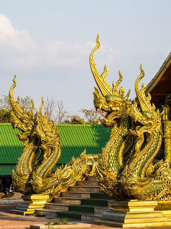 Naga statues decorated in buddhist temple.の写真素材