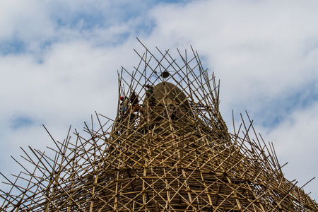 BAGAN,MYANMAR-MARCH 8:Pagoda renovation by Buddhist and the monk on March 8,2017 in Bagan,Myanmar.の写真素材
