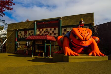 YAMANASHI, JAPAN - NOVEMBER 24, 2019: Orange giant frog at Fuji Q highland in Fujiyoshida,Yamanashi,Japan.Fuji Q Highland is amusement park with Mt.Fuji background.のeditorial素材