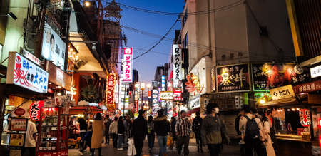 OSAKA, JAPAN -DECEMBER 1,2019: Visitors  walking at  Dotonbori street in the Namba District. This area is one of the most popular destination for tourist in Osaka city.のeditorial素材