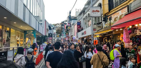 TOKYO,JAPAN - NOVEMBER 18, 2019: People visit Takeshita street in Harajuku in Tokyo Japan.This place is destination  for teenager lifestyle in Tokyo.のeditorial素材