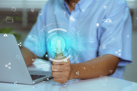 Using fingerprint scanning, the businessman accesses and unlocks the cloud data network. Cyber security and biometric identification protect business transactions from online cyber attacks.の写真素材