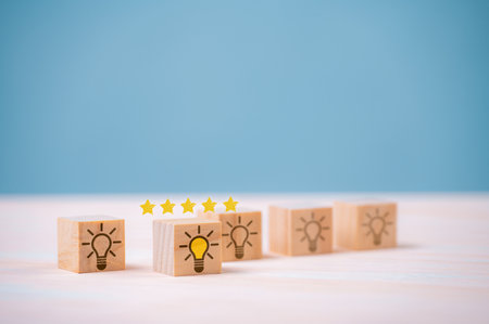 Creative Design Solutions with Wooden Blocks: Inspiring Ideas, Strategies, and Collaborative Thinking for Success in Business and Marketing.の写真素材