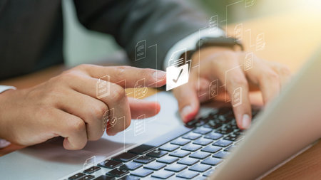 Businessman checking Document Management System (DMS) and approve. Streamline online docs, enhance...