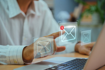 Business email, global communications, digital marketing. Businessman uses smartphone email and world on virtual screen. Message from Email Connection Message to Email Contact Global Letterの写真素材