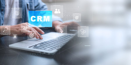 CRM - Customer Relationship Management. Businessman hold of global structure , Data exchanges development. customer service, social media, HR, digital marketing online.の写真素材