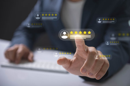 Customer feedback and review good rating concept, person in a business suit interacting with floating digital 5-star customer reviews. testimonial and testimony, user comment and feedback for review.の写真素材