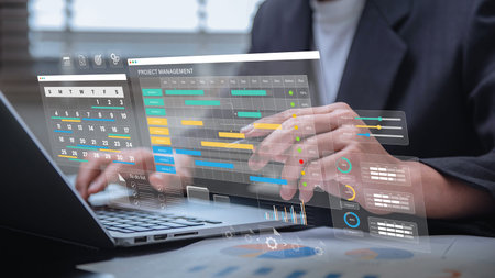 Project management and workflow scheduling interface. A business professional analyzing Gantt...