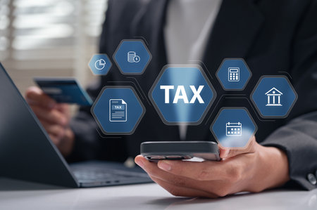 Mobile tax payment and fintech integration concept with businessman using smartphone and credit card, showing online financial transaction, digital tax filing, and secure accounting tools.の写真素材