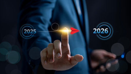 Concept of business transformation and future planning from 2025 to 2026 showing finger launching red arrow toward goal, representing leadership, direction, and strategic roadmap for successの写真素材