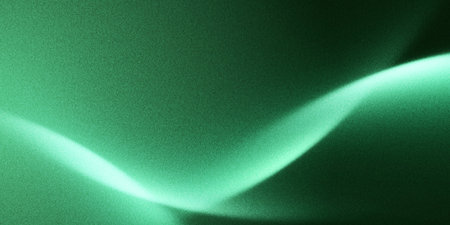 glowing green light with smooth curves and soft grain. abstract green background with soft flowing curves and grain texture in glowing light gradient for digital design, eco brandingの写真素材