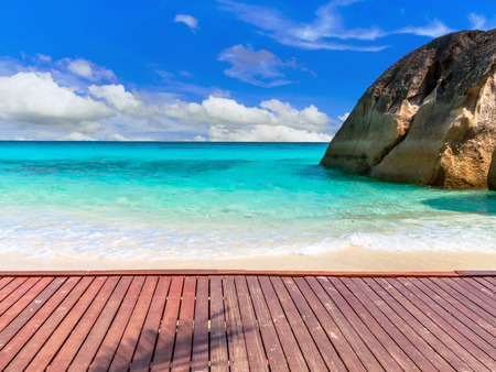 Rocks surrounded by turquoise seas.の写真素材