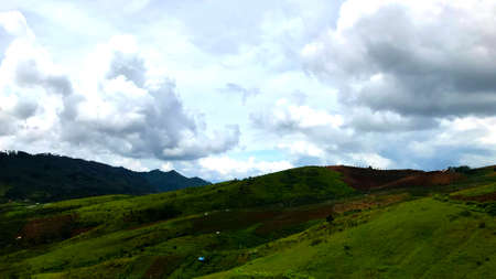 Blue White Sky Background Mountain Wallpaper with Cloudsの写真素材