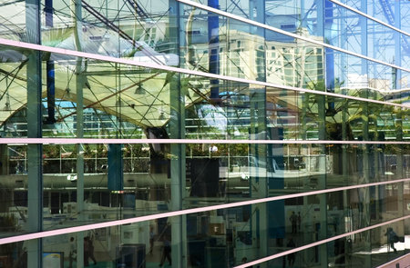 Abstract  background - overlapping reflections in the windows of a modern conference hall