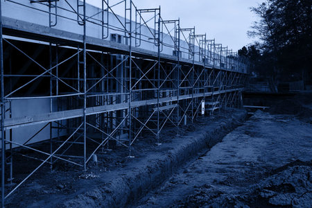 Scaffolding for a new parking lot under construction - blue monochrome