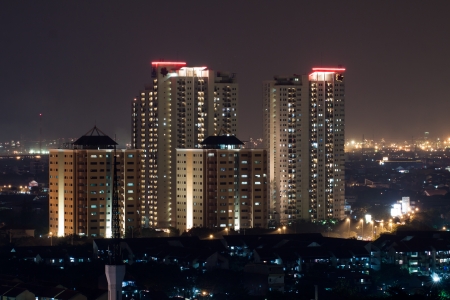 Maple Park Apartments buildings in Jakarta at night.のeditorial素材