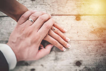 Couple in love. Celebrating their love and holding hands.の写真素材