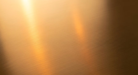 Gold metal background or texture and gradients shadow. Abstract background.の素材