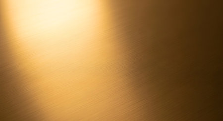 Gold metal background or texture and gradients shadow. Abstract gold metal background.の素材