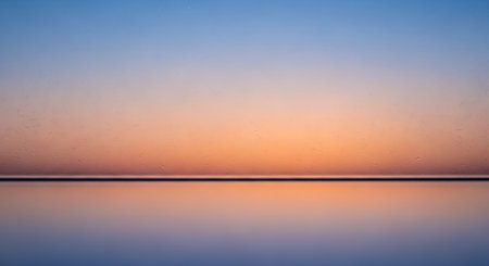 Reflection of the sky in the water at sunset. Abstract backgroundの素材