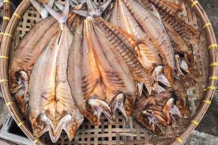 Dried salted fishes on basketry