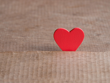 Valentines day background with red heart on wood floor. Love and Valentine concept. Happy Valentine's day.の写真素材
