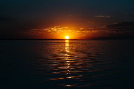 Colorful sunset over the lakeの写真素材