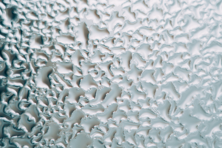 water drops on glass, window with condensation, close-upの写真素材