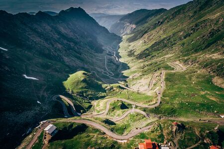 Curving road on Transfagaras pass in Carpathian mountains Romania, aerial viewの写真素材