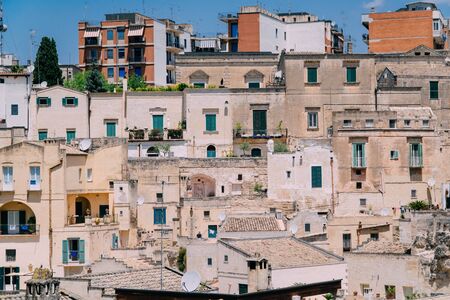 Background in the form of a heap of old stone houses on the streets of an ancient European city.の写真素材