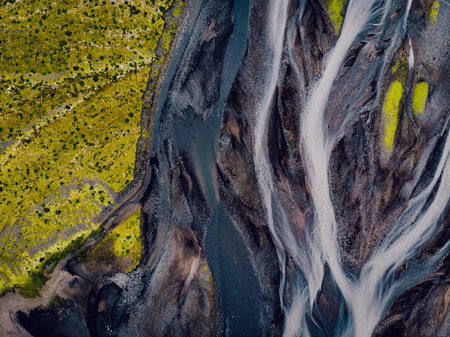 Aerial top down view of glacial river in Iceland, drone shot
