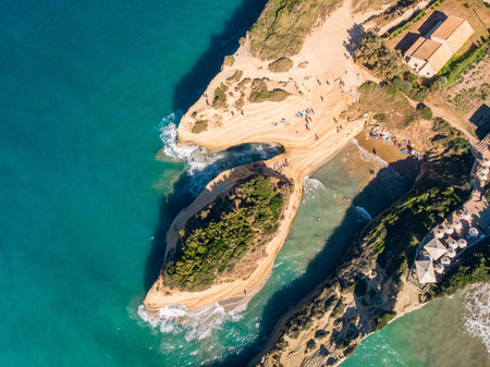 Aerial view of beautiful beach with blue water. Channel of Love on island of Corfu, Greece. Top down view.の写真素材
