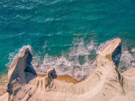 Top down view of deserted shore. Steep coast of Corfu island, Greece.の写真素材