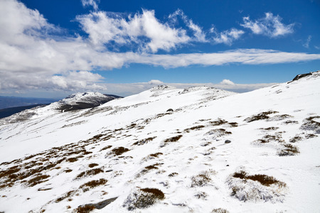 icy hillside on a blue dayの写真素材