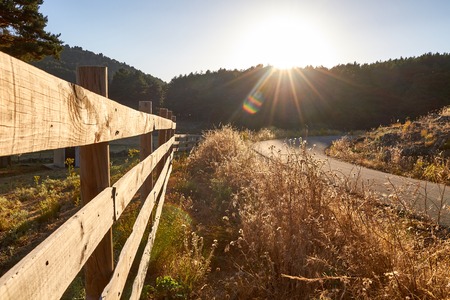 Wood fence on a countryside backgroundの写真素材