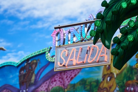 spanish exit neon sign in funfairの写真素材