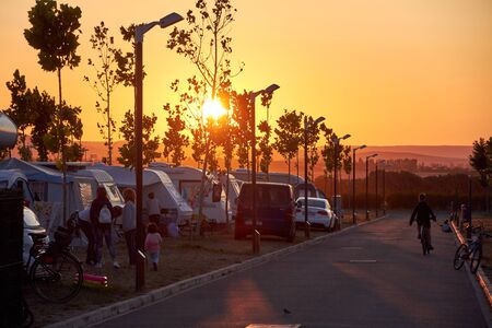 SPAIN CIRCA AUGUST 2018 vans tent campsite on the sunset with some treesのeditorial素材