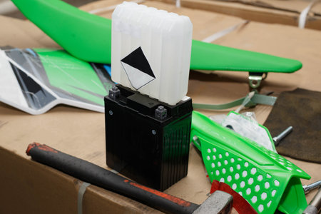 The process of refueling a new motorcycle battery.
