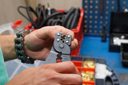 The wizard is preparing a new electrical wire to replace the damaged one on the motorcycle. Repair...