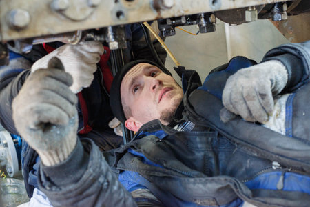 Repair of a diesel generator converted to gas.の写真素材