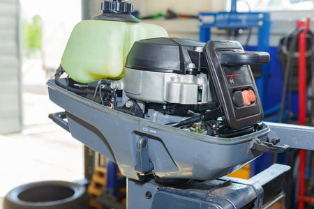 The master carries out maintenance of the boat motor.