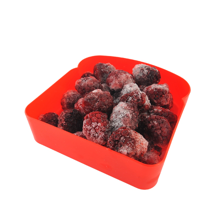 frozen blackberry in a red plastic box.の写真素材