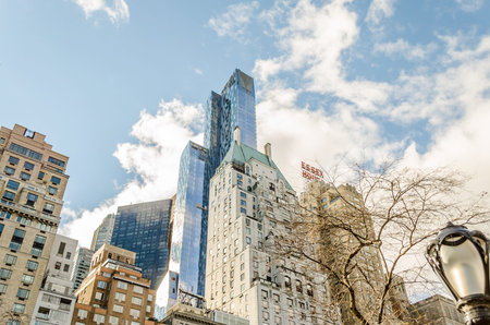 Low Angle View of Manhattan Buildings and Skyscrapers in Central Park South on a Sunny Christmas Day