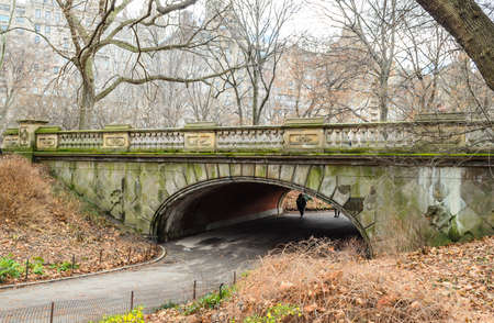 A Beautiful Old Stone Arch in Central Park, Manhattan, New York, USA.の写真素材
