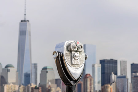 Close up Photo of Coin Operated Binoculars with View in Manhattan Cityscape, Skyscrapers and Towers,...